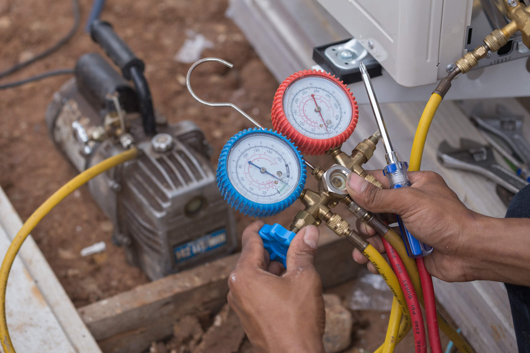 Lampkins Comfort HVAC Repair Service with Pressure Gauges